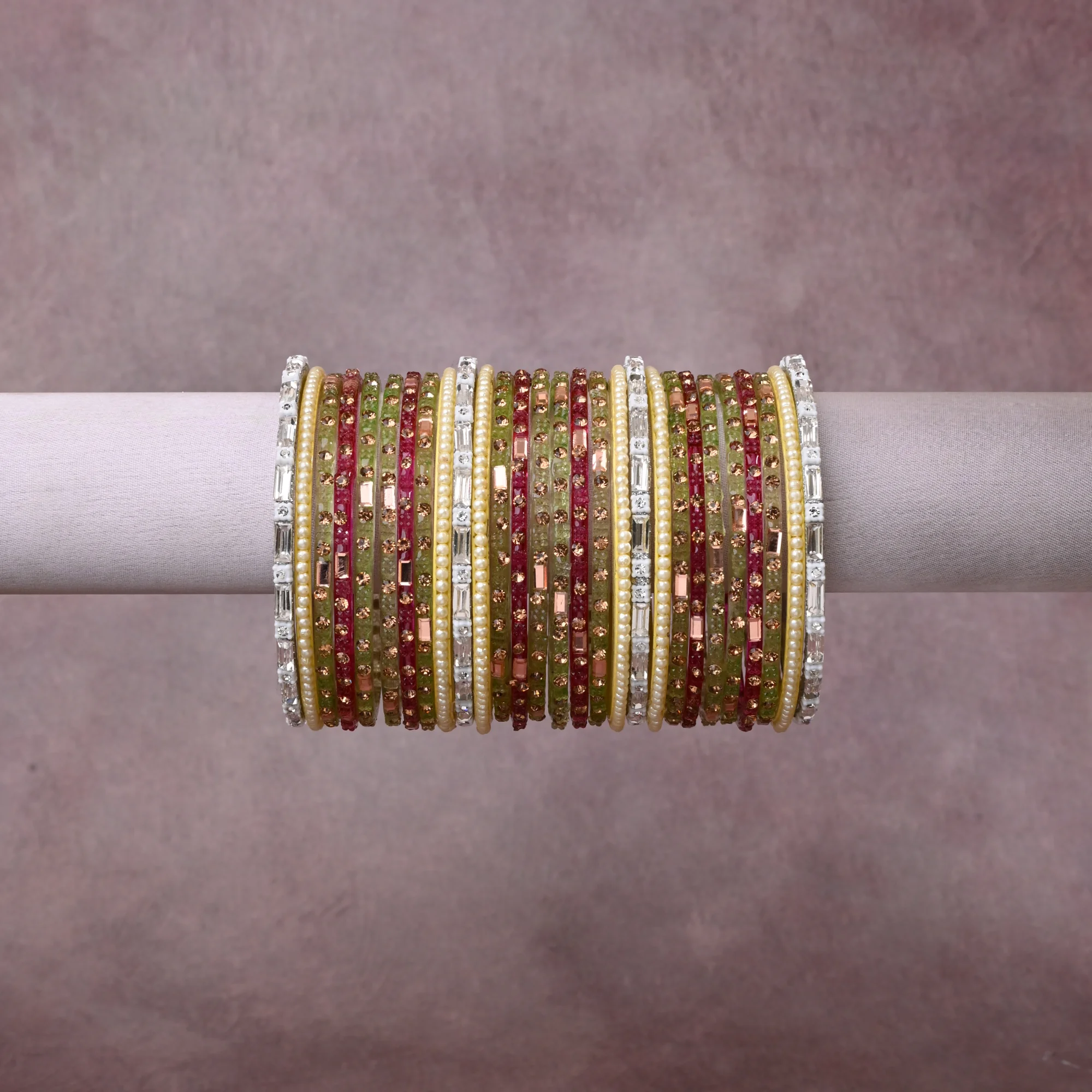 A grounding Olive Green forms the heart of the set, while touches of Cream, Clear Crystal, Rose Gold add charm.

A thoughtful composition of Glass, Faux Pearl, Metal Alloy, designed to feel complete without being heavy.
Each element layers seamlessly, creating a look that is refined, wearable and quietly striking.